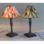 Pair of modern Tiffany style table lamps with multicoloured abstract conical shades. (2) (B.P. 21% +