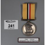 Queen Elizabeth II Iraq medal, awarded to 25152913 Fusilier J E Benham, Royal Welsh Fusiliers. (B.P.