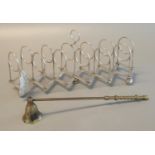 Unusual silver plated five-section extending toast rack, together with a brass candle snuffer. (