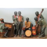 Six piece composition group of figures, a jazz band with musical instruments: trumpet, piano, drums,