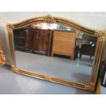 19th century style gilt framed bevel plate over mantel mirror with foliate mouldings. 128 x 90cm