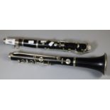 French ebonised and metal mounted clarinet marked Windsor Styleworks, Birmingham(?) (B.P. 21% + VAT)