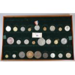 Coin board of approximately 26 commemorative medals to include The Sail Training Association Sir