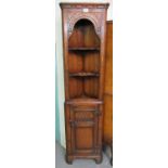 Titchmarsh & Goodwin, good quality oak carved corner cabinet of narrow proportions. (B.P. 21% + VAT)