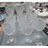 Set of six wine glasses together with another set of six moulded hobnail cut design wine glasses. (