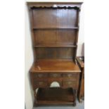 Reproduction oak two-stage rack back pot board dresser of narrow proportions. (B.P. 21% + VAT)