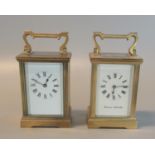 Two French lacquered brass carriage clocks with full depth Roman dials. One with glass broken.