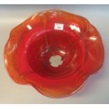 Modern red ground art glass vase of waved form, indistinct signature to the underside. (B.P. 21% +
