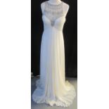 Jenny Packham designer wedding dress bearing the original labels, described as an ivory bridal gown
