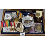 Wooden box of military interest to include medal groups from WWI & WWII, silver frame with black and