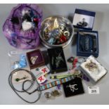 Shoe box of assorted costume jewellery to include brooches, glass pendant, abalone shell brooch,