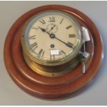 Early 20th century Smiths 'Astral' brass bulkhead clock with Roman face, having second dial,