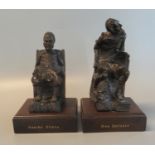 Pair of carved wooden bookends now mounted on associated wooden plinths, 'Don Quixote' and 'Sancho