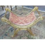 French design gilded gesso 'X'-framed upholstered stool with scroll arms and baluster turned