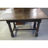 17th Century oak pleated two plank top side stretcher table, the moulded top above gun barrel