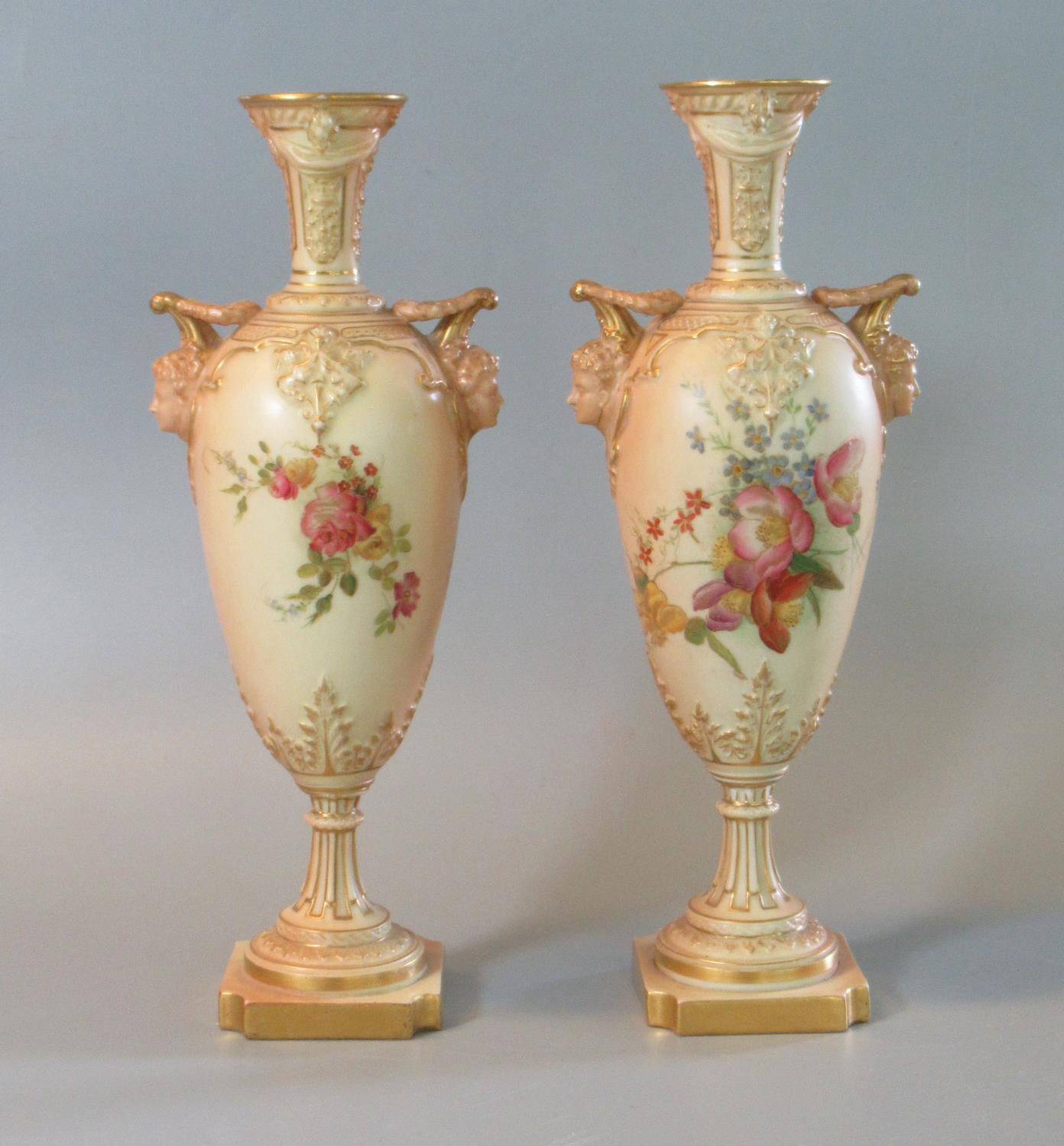 Pair of Royal Worcester blush ivory 1410 hand painted vases of oval form having classical flared