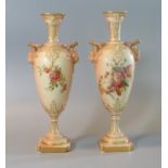 Pair of Royal Worcester blush ivory 1410 hand painted vases of oval form having classical flared