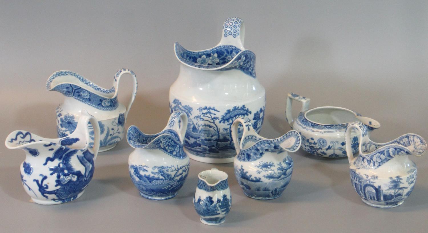 Group of 19th century Spode china blue and white transfer printed jugs of various sizes and