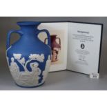 Wedgwood blue and white Jasperware "The Portland Vase "(a copy), 26cm high approximately. Together