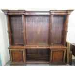 Victorian walnut and ebonised indented break front open library bookcase having moulded pediment