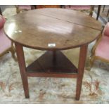 Traditional 19th century Welsh oak cricket table with triangular under tier. 70cm diameter, 80cm