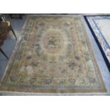 Large Chinese cream ground foliate carpet with central oval-shaped foliate medallion. 369 x 276cm