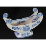 19th century Spode china blue and white transfer printed stilton cradle of scrolled pedestal form,