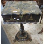 Victorian papier-mâché pedestal work box with foliate brass mounts, the pie crust edge hinged