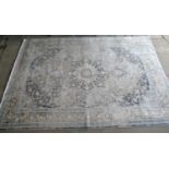 Vintage style Persian fine woven bamboo silk carpet on a white ground with central medallion