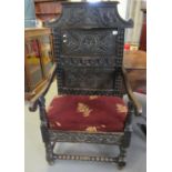 19th century carved oak Wainscott type chair, the back with carved decoration of flowers, flower