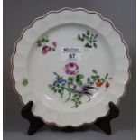 18th century Worcester first period plate or shallow dish, hand painted with floral sprays.