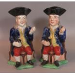 Pair of late 18th/early 19th century Staffordshire pottery toby jugs of seated topers with foaming