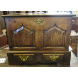 18th century style Welsh oak coffwr bach, the moulded top above two pointed ogee fielded panels, the