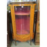 French design, probably kingswood, bow front display cabinet, the moulded stepped top above a