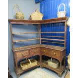 Unusual 19th century Welsh pine corner dresser having two shelf open rack back and four frieze