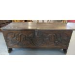 17th century oak plank coffer, the moulded and hinged lid with candle box to the interior above a