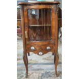 French design walnut pier or display cabinet, the moulded and shaped top above a single glazed door,