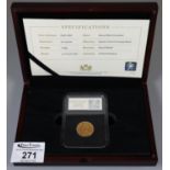 1879 Queen Victoria young head gold shield-backed sovereign. In plastic case with wooden box and
