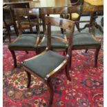 Set of eight 19th century mahogany dining chairs, the curved backs above stuff over seats,