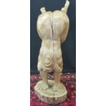 Michael Hall (Welsh 20th century), 'Spitfire' carved oak study of a woman performing a handstand