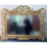 19th century style gilt Gesso bevel plate mirror, the frame with pierced scroll and foliate