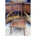 Primitive ash stick back elbow chair with solid square seat on three legs. Probably Welsh. 105cm