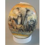 Ostrich egg with transfer printed decoration of the map of Africa with various African animals and
