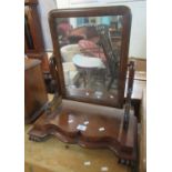 19th century mahogany toilet or bedroom swivel mirror with shaped front. (B.P. 21% + VAT)