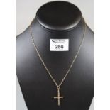 9ct gold crucifix on chain. Approx weight 3 grams. (B.P. 21% + VAT)