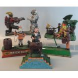 Collection of five cast iron painted novelty money boxes to include trick dog, magician, bear,