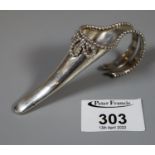 A silver corsage or florsl spray holder with beaded decoration and split handle by Garrards