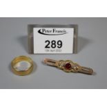 22ct gold wedding ring, ring size O. Together with a 9ct gold bar brooch set with garnet and seed