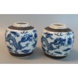 Pair of Chinese Stoneware Crackle glaze Blue and white Ginger Jars, decorated with dragons amongst