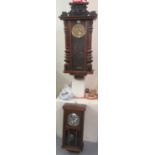 Early 20th century walnut two train Vienna type wall clock, together with a mid century oak three-